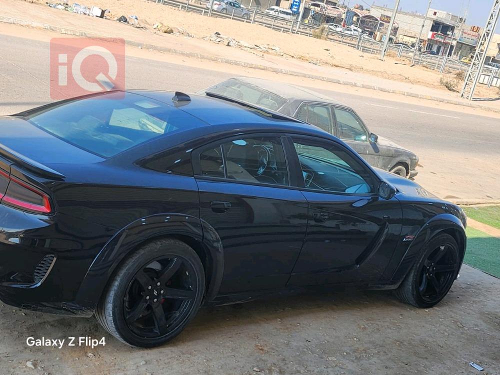دۆج چارجەر